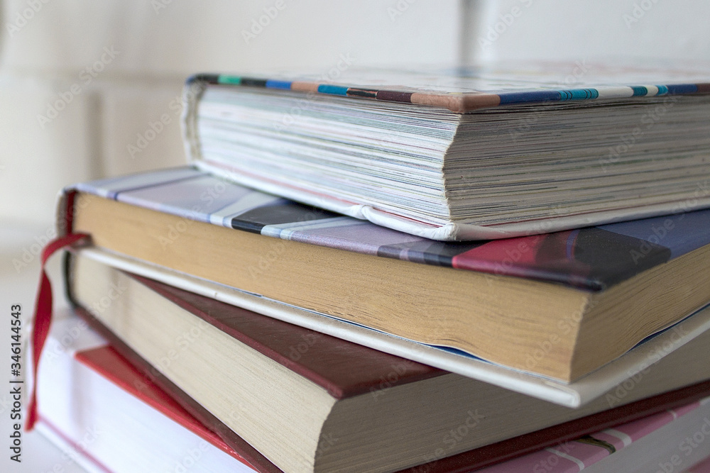 Education. A stack of books on a white background. Education. A stack of books on a white background.