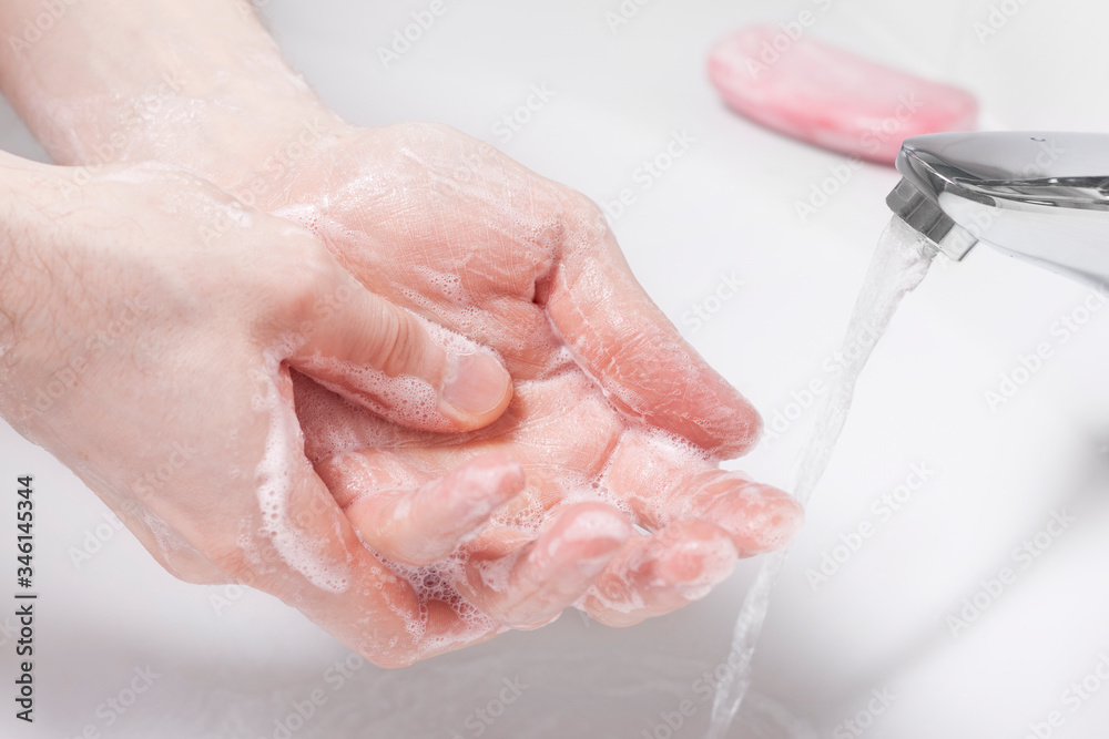 Hand washing with soap. Concept of hygiene, healthy lifestyle, protection from bacteria. Hand washing with soap. Concept of hygiene, healthy lifestyle, protection from bacteria.