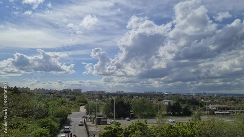 Timelapse of clouds above Prague city. Fast moving clouds above city in summer.