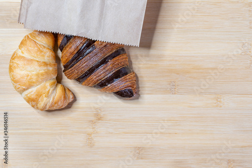 Croissants in take away bag