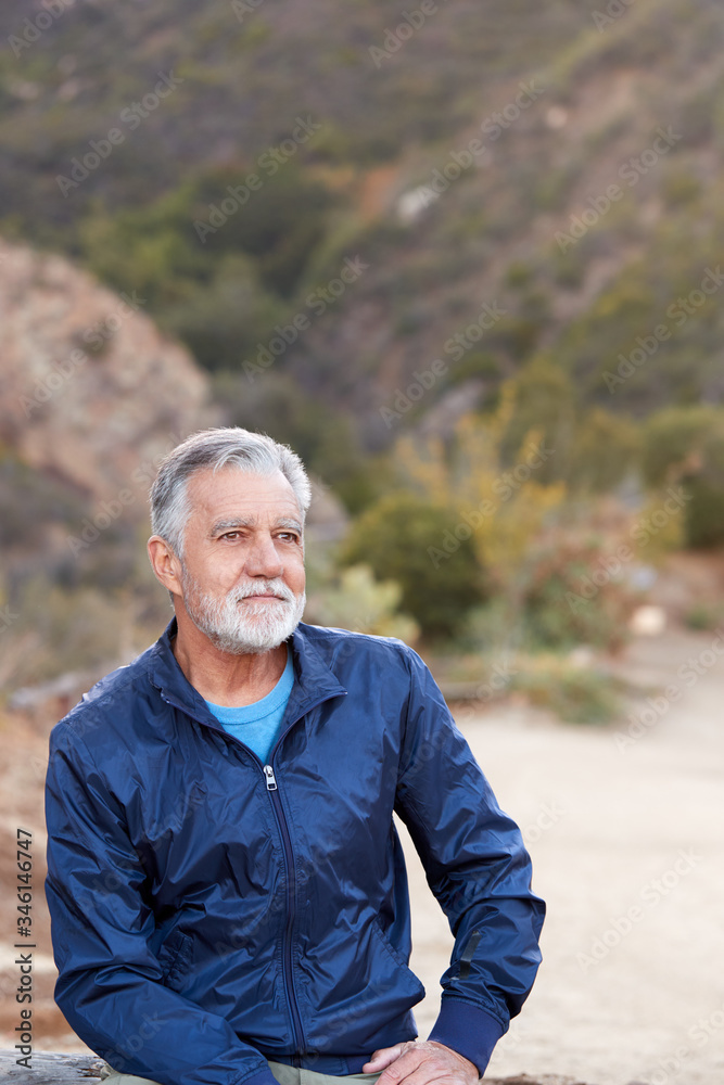 Outdoor Portrait Of Serious Hispanic Senior Man With Mental Health Concerns Outdoor Portrait Of Serious Hispanic Senior Man With Mental Health Concerns
