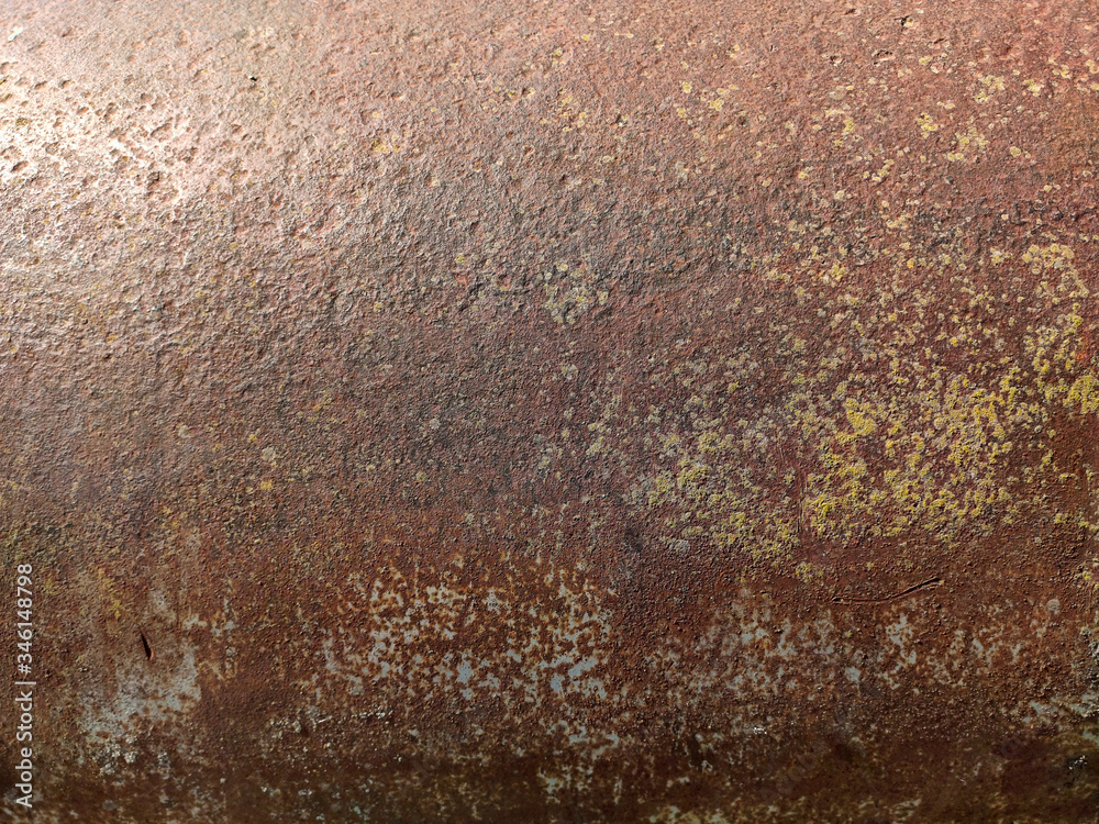 Rusty metal panel with cracked paint, corroded grunge metal background Rusty metal panel with cracked paint, corroded grunge metal background