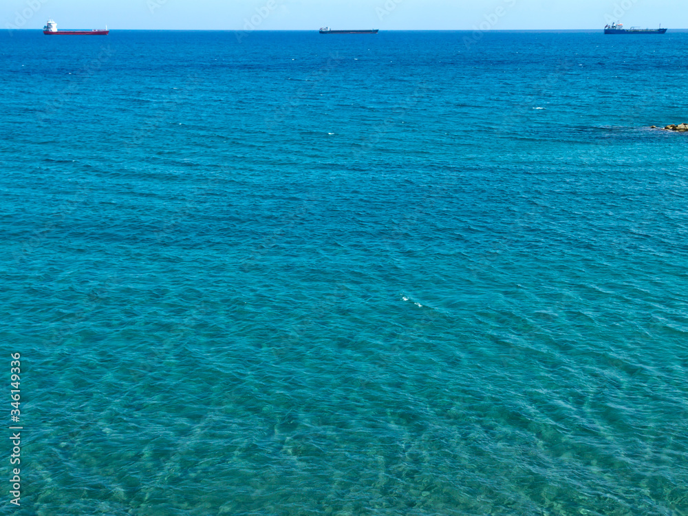 Fototapeta premium Blue sea water surface and ships