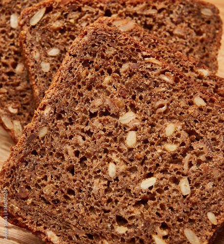 sliced black cereal bread on the table