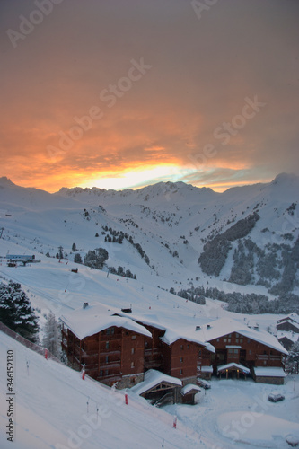 Sunsetting over Les Arcs 2000 paradiski ski area Massif de La Vanoise, high Tarentaise valley Savoie France