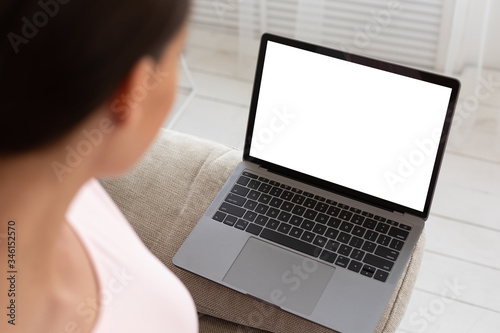 Unrecognizable Woman Looking At Laptop Empty Screen At Home, Mockup