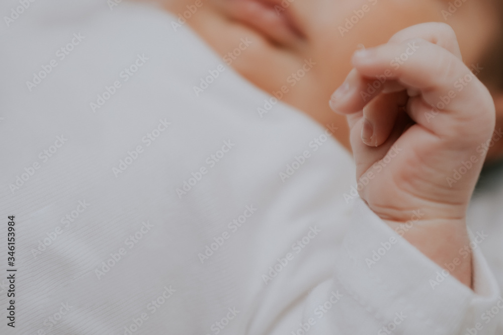 gentle hands of a newborn.