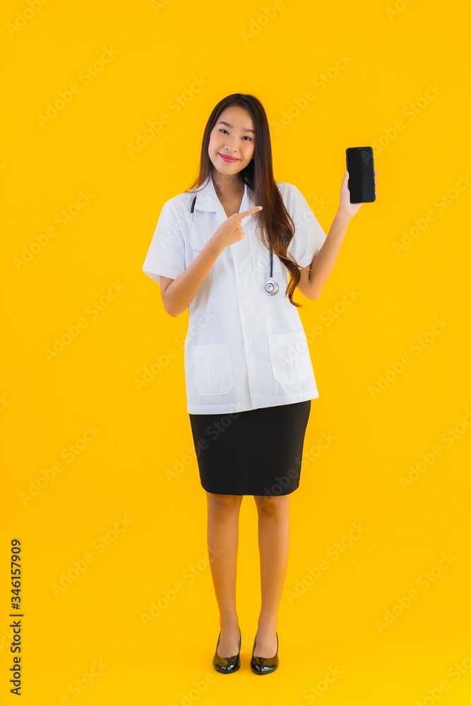 Portrait beautiful young asian doctor woman use smart mobile cell phone Portrait beautiful young asian doctor woman use smart mobile cell phone