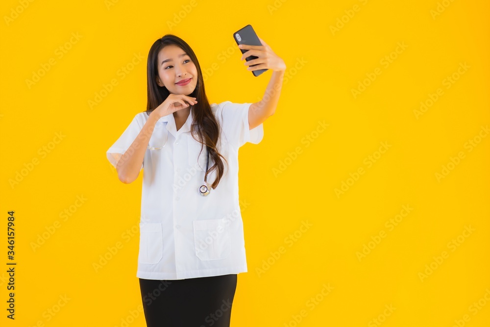 Portrait beautiful young asian doctor woman use smart mobile cell phone Portrait beautiful young asian doctor woman use smart mobile cell phone