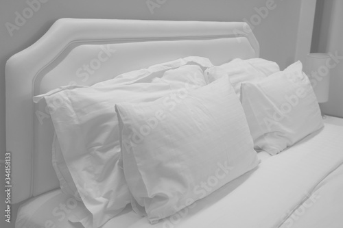 Close up white pillows on the bed. © Sunisakanphian
