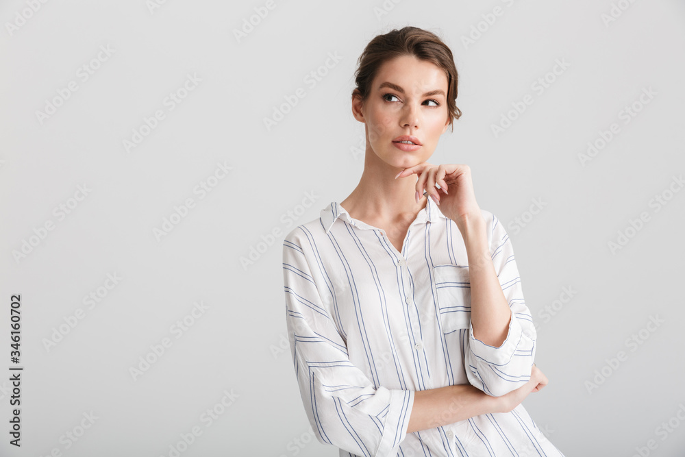 Image of serious beautiful woman thinking and looking upward Image of serious beautiful woman thinking and looking upward