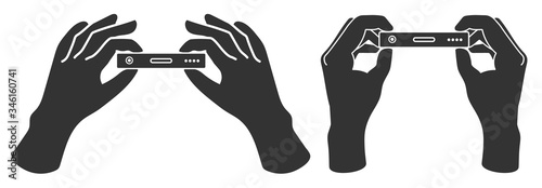 Hands holding smartphone with side of charger port. Vector icon set in flat style.