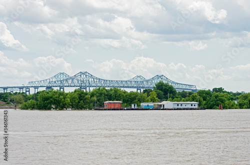 Pier and crescent city connection bridge at algiers point photo