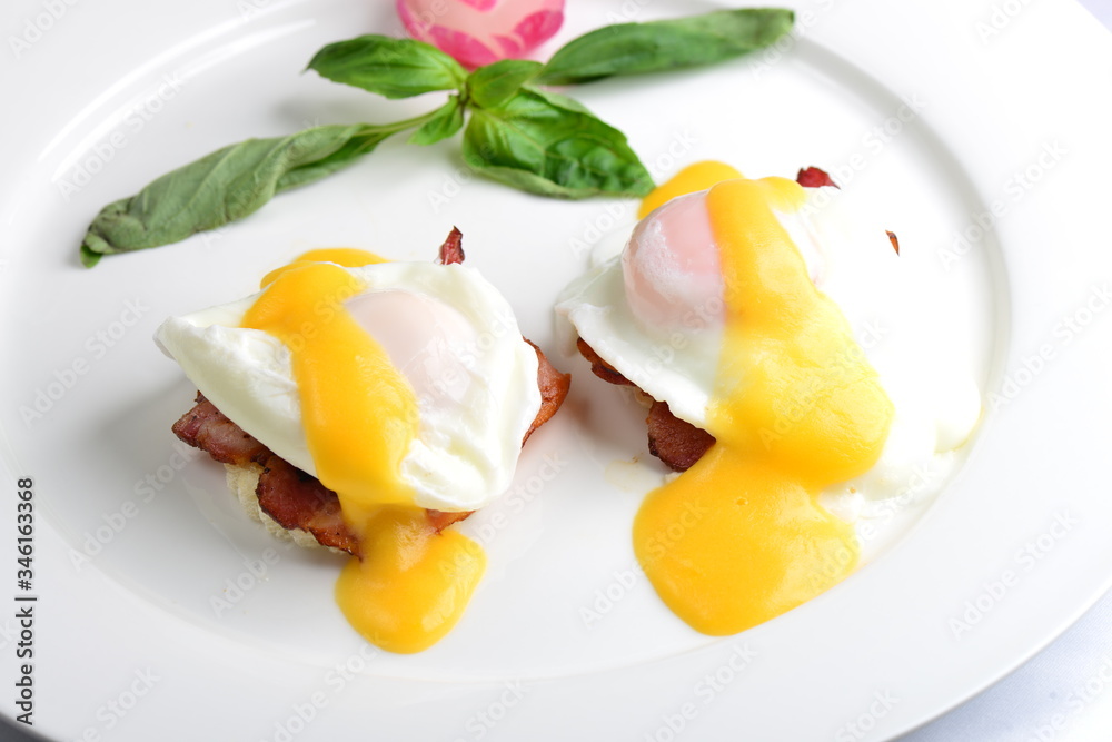 Delicious breakfast with eggs Benedict Delicious breakfast with eggs Benedict