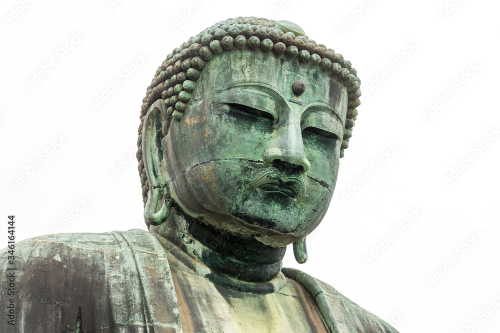 Kamakura, Japan. Views of the Great Buddha (Daibutsu), large bronze statue representing Amida Buddha (Amitabha) in Kotoku-in Buddhist temple Kamakura, Japan. Views of the Great Buddha (Daibutsu), large bronze statue representing Amida Buddha (Amitabha) in Kotoku-in Buddhist temple