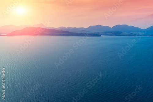 Wallpaper Mural Island on the horizon. Rocks in the sea. Beautiful rocky sea landscape in the evening. Wild nature of Norway. Lofoten islands seascape. Gradient color Torontodigital.ca