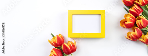 Mother's Day Design Concept, Tulip flower bunch - Beautiful Red, yellow bouquet isolated on white background table, top view, flat lay, copy space