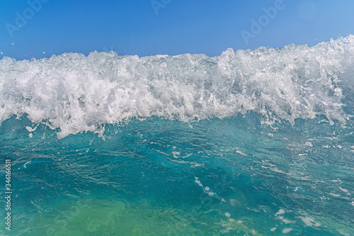 A perfectly formed wave and blue sea