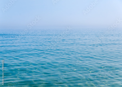 Beautiful sea and blue sky on a fog morning