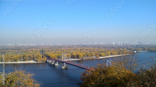 Old bridge of Lovers across the blue river Dnipro