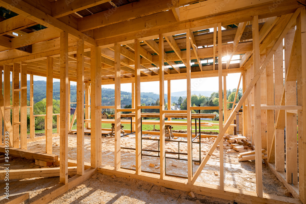 Interior frame of new wooden house under construction