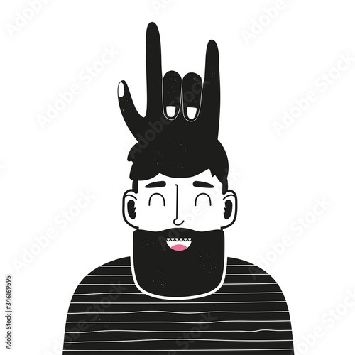 Happy smiling bearded man with cool hand rock sign hairstyle.