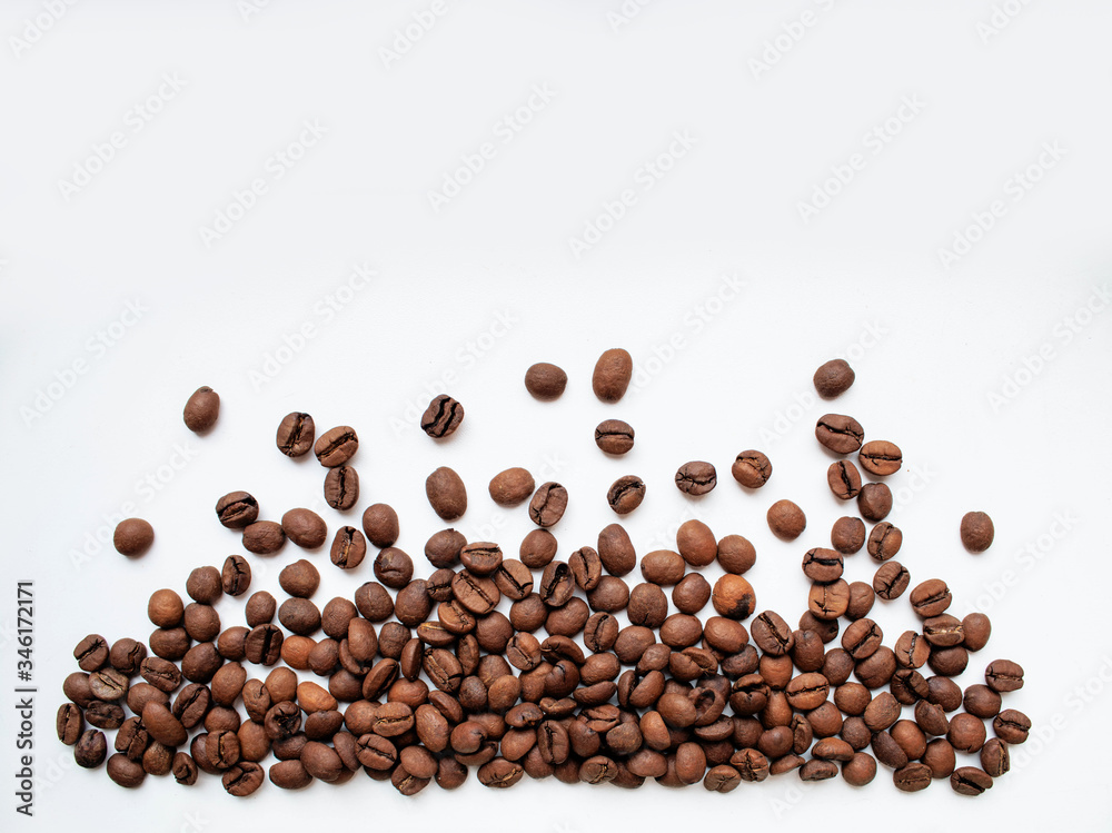 Coffee beans isolated on background with copyspace for text. Coffee background or texture concept. Coffee beans isolated on background with copyspace for text. Coffee background or texture concept.