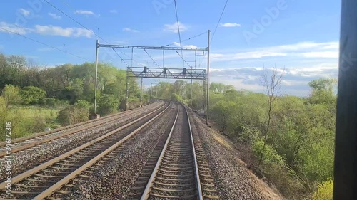 Timelapse of railway from train. rear view from train on railroad in nature during the spring.