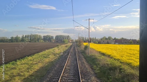 Timelapse of railway from train. rear view from train on railroad in nature during the spring.