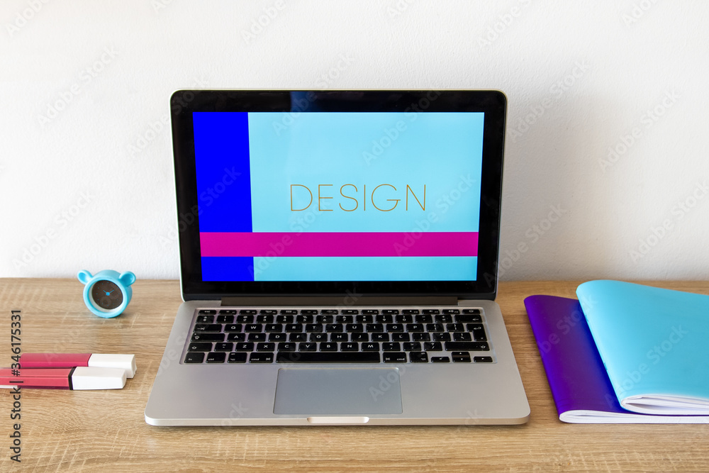 The laptop is on the table. Near accessories. On screen design The laptop is on the table. Near accessories. On screen design