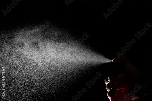 jet of water from the sprayer on a black background