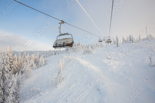 Ski lift in the snow mountains