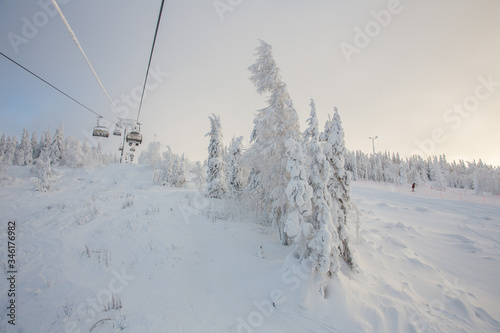 Ski lift in the snow mountains