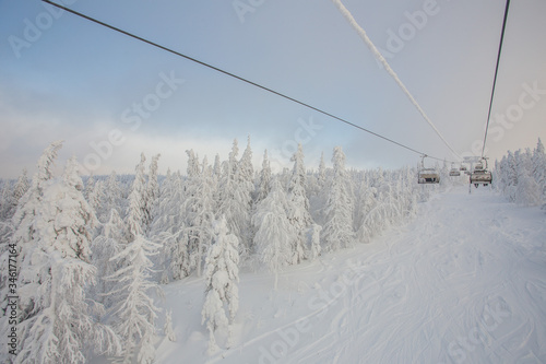 Ski lift in the snow mountains