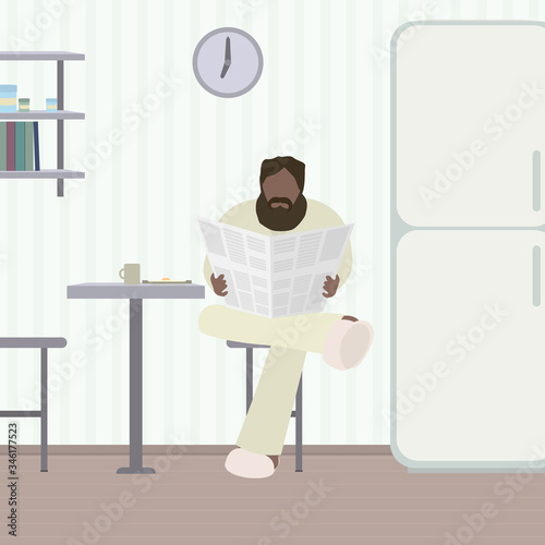A man reads the news at a wholesome breakfast..A man reads the news in a newspaper in the kitchen during breakfast, background.