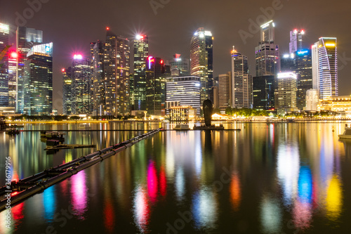 Singapore financial district skyline with colourful reflections 