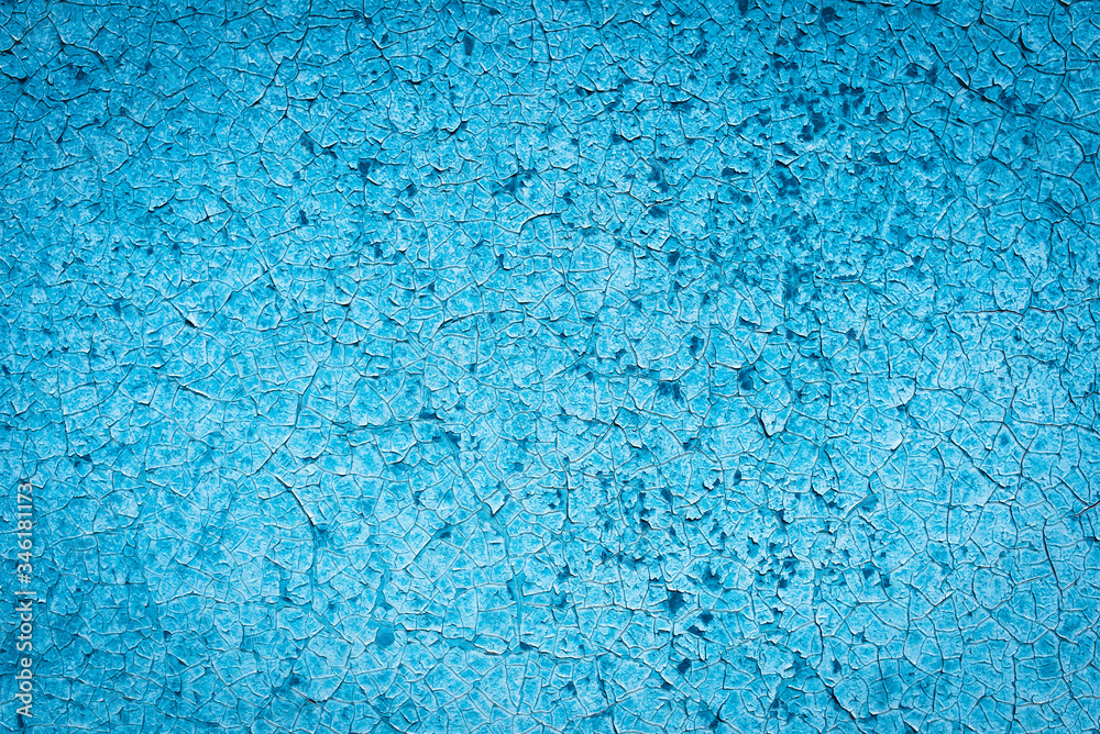 Texture of a rusty metal surface: dark blue, blue, aged cracked paint. Background of old painted sheet metal with rust painted in blue. Texture of a rusty metal surface: dark blue, blue, aged cracked paint. Background of old painted sheet metal with rust painted in blue.