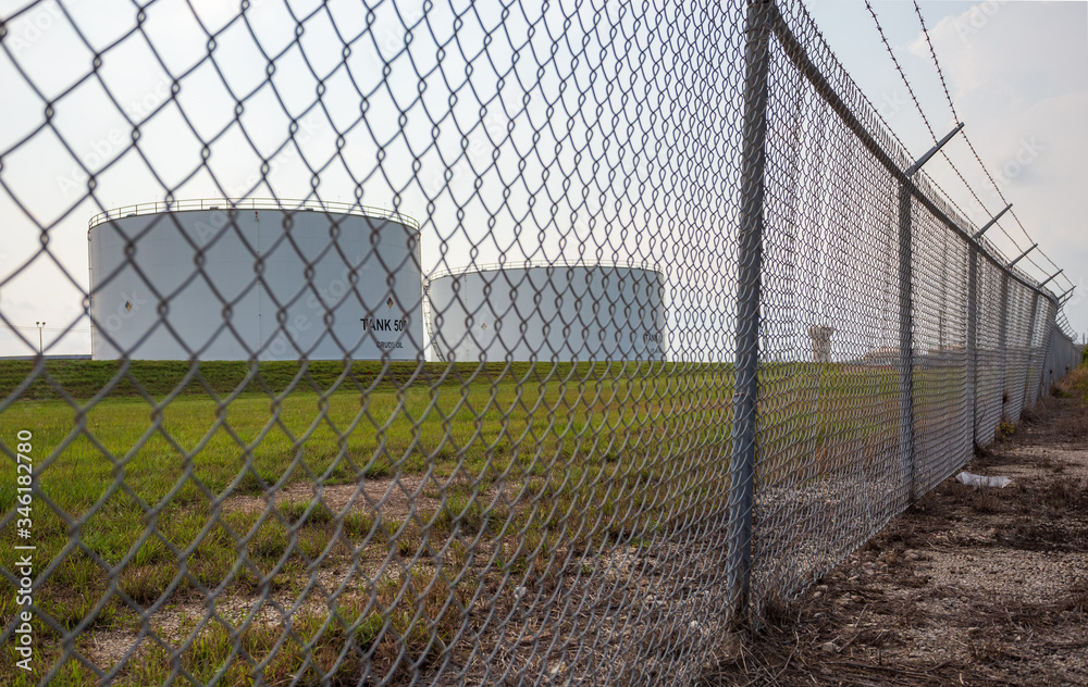 Houston TX/USA - May 2020: Crude oil storage tanks in Webster, League City, Texas Houston TX/USA - May 2020: Crude oil storage tanks in Webster, League City, Texas