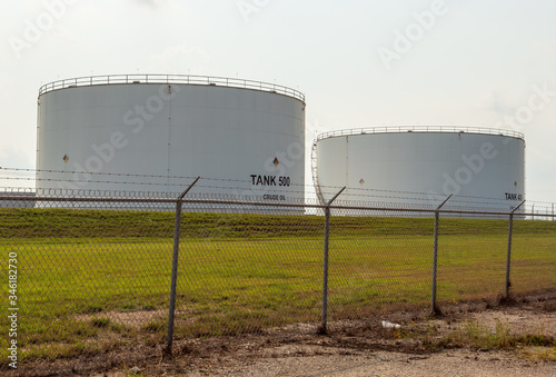 Houston TX/USA - May 2020: Crude oil storage tanks in Webster, League City, Texas photo