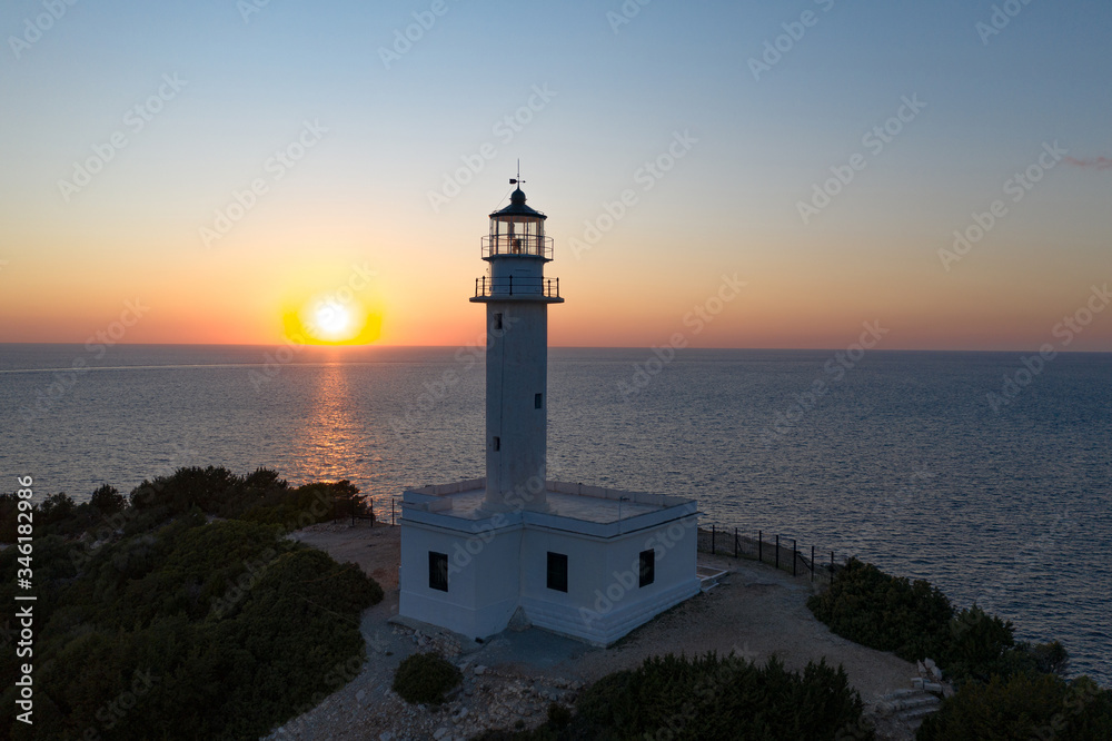  Orange sunset  in Cape Doukato. Lefkada island, Greece, Lighthouse view