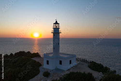 Orange sunset in Cape Doukato. Lefkada island, Greece, Lighthouse view