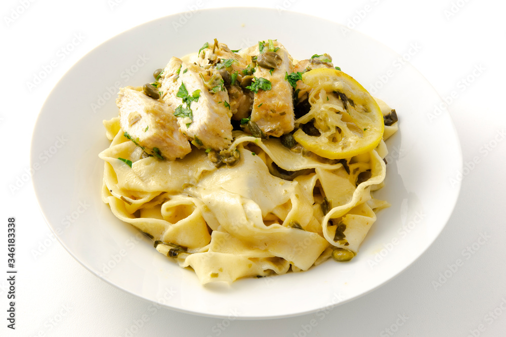Chicken piccata with sauce, lemon and capers