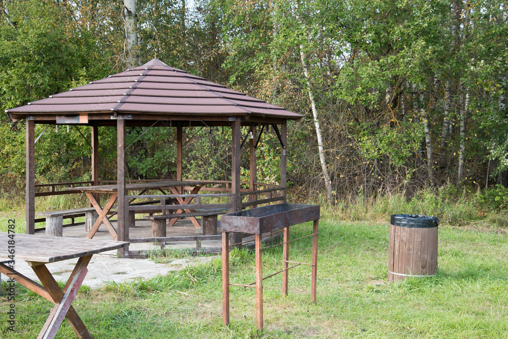 A place for barbecue and outdoor recreation. Table and benches under a canopy in the bosom of nature. Fresh air and calm. A place for barbecue and outdoor recreation. Table and benches under a canopy in the bosom of nature. Fresh air and calm.