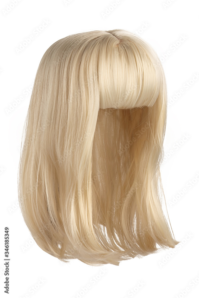 Fototapeta premium Subject shot of a natural looking golden blonde wig with bangs. The shoulder-long wig is isolated on the white background. 