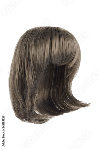 Subject shot of a natural looking ash gray wig with bangs. The shoulder-long wig is isolated on the white background. 