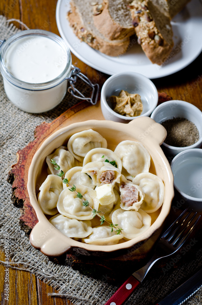Boiled dumplings. Traditional meat dish of Russian cuisine Boiled dumplings. Traditional meat dish of Russian cuisine