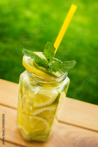 minth lemonade in jar garden background photo