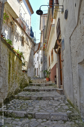 Fototapeta Naklejka Na Ścianę i Meble -  A narrow street in the medieval town of Itri, in the province of Latina