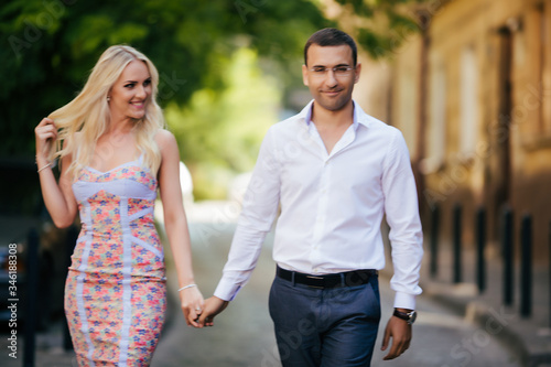 Smiling couple in love outdoors, lviv. summer