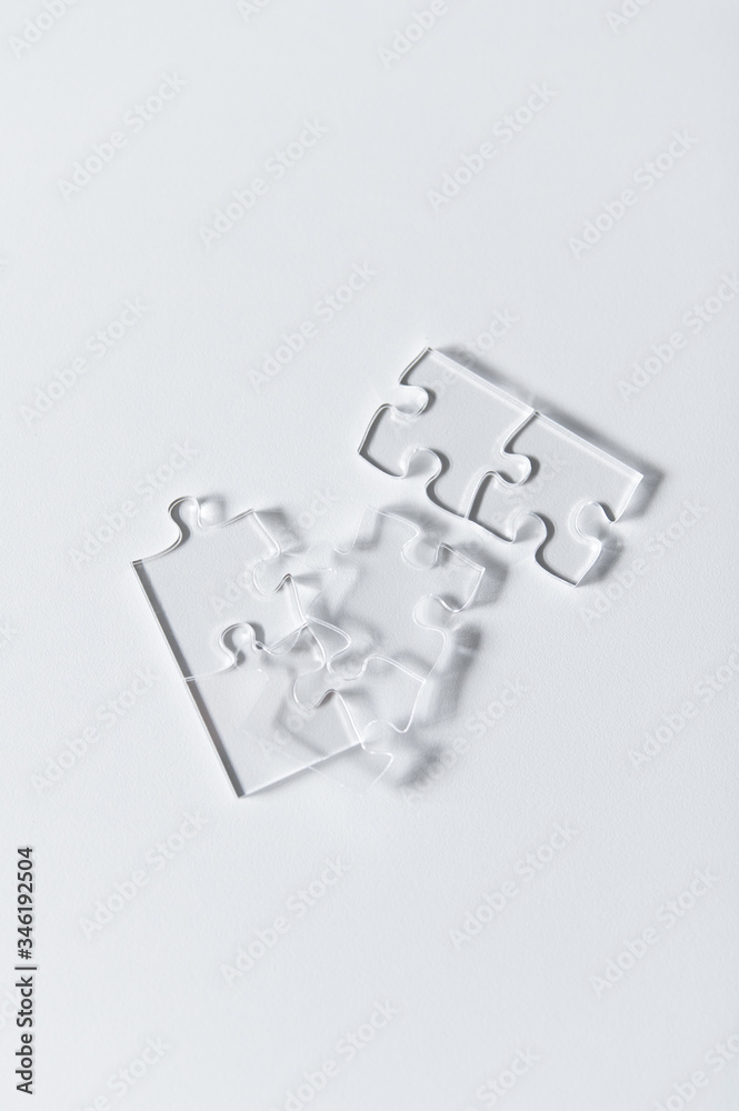 Clear puzzle pieces. Clear puzzle pieces.
